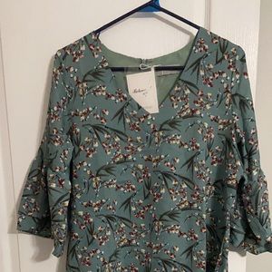 Dress with ¾ ruffle sleeves